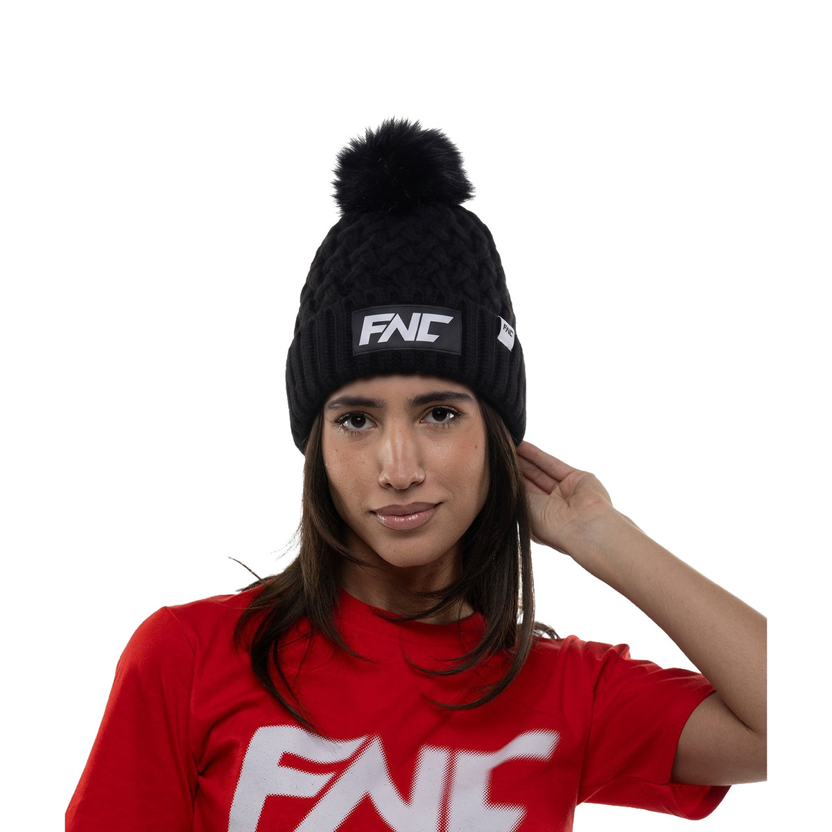 FNC Women's Black Cable Knit Pom Beanie worn by model, front view