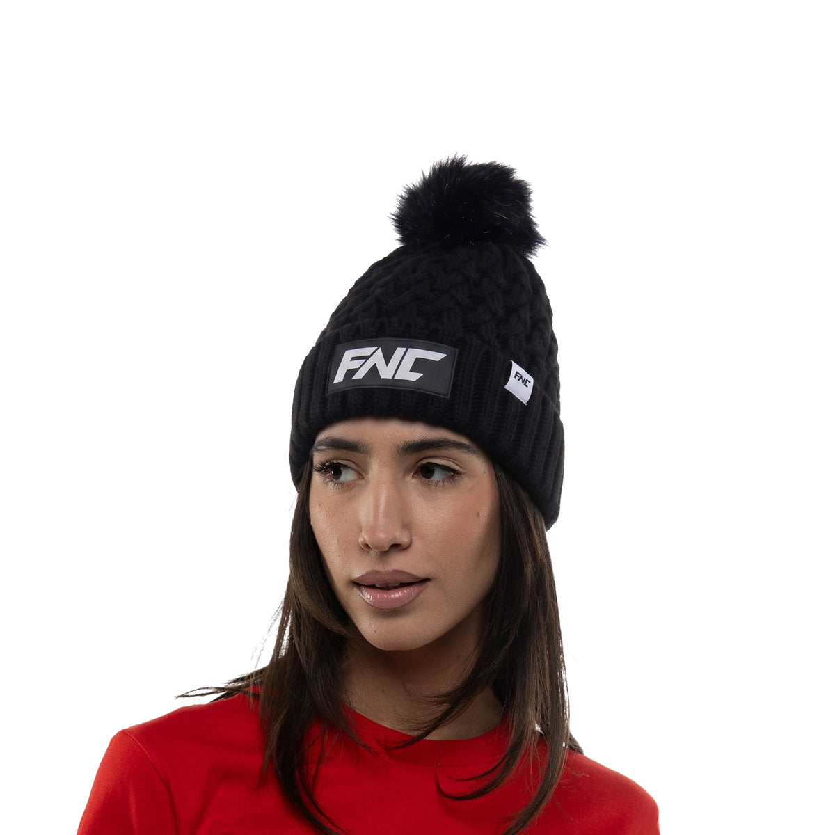 FNC Women's Black Cable Knit Pom Beanie worn by model, side view